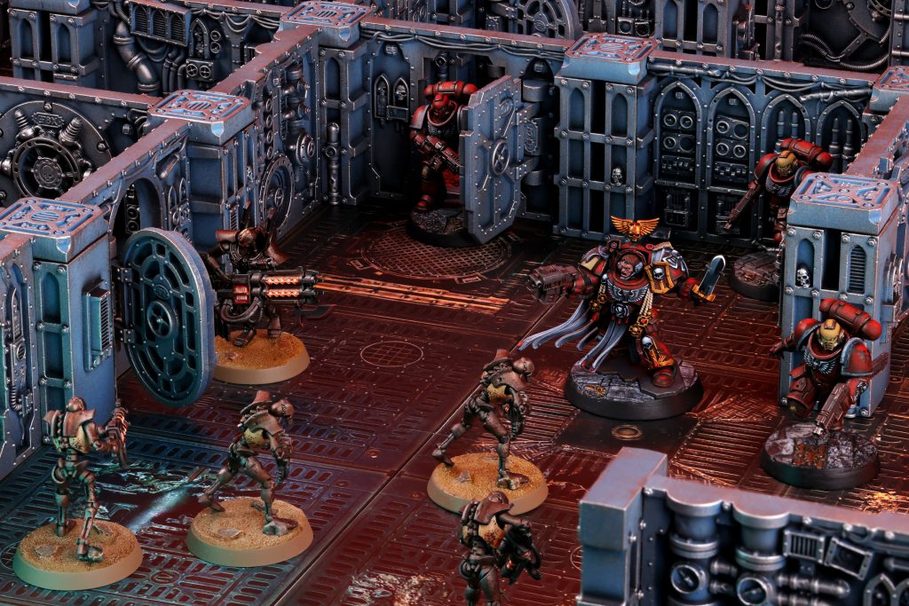 Blood Angels Space Marines and Necrons on Boarding Actions Terrain by Pendulin