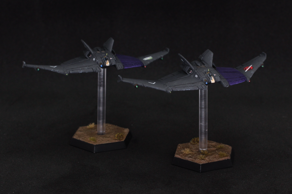 A pair of Shilone aerospace fighters.