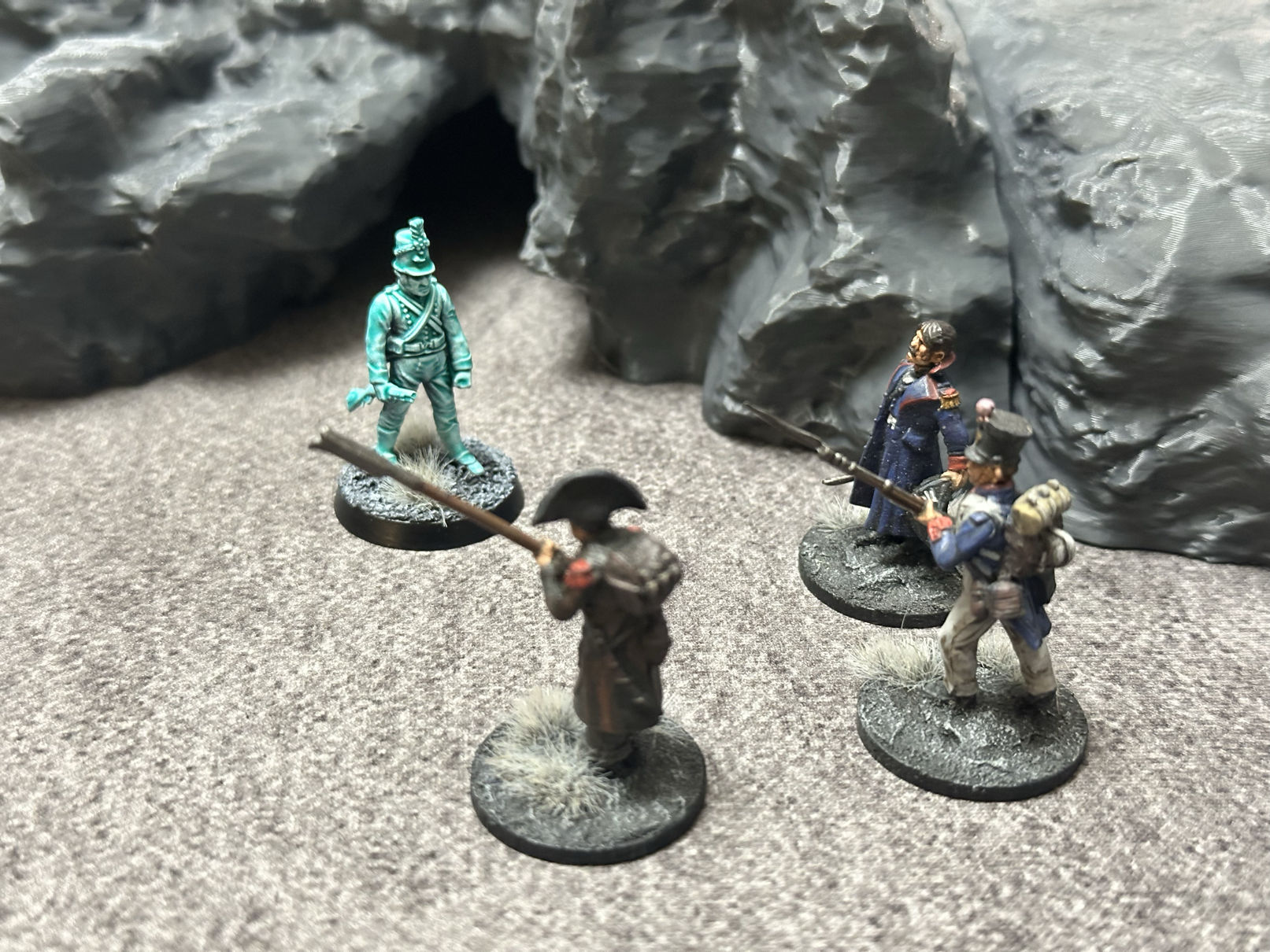 Three soldiers surround a Ghost